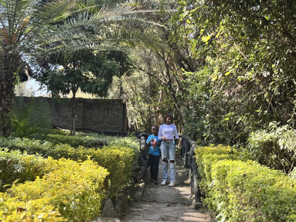 A woman and a young boy on Dove Nest Ledge grounds